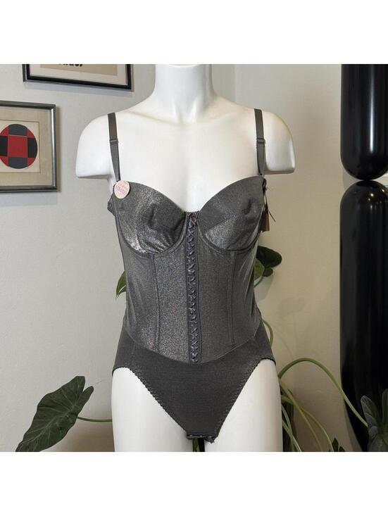 Other - Vintage Silver metallic corset top with adjustable straps and lace-up front.
